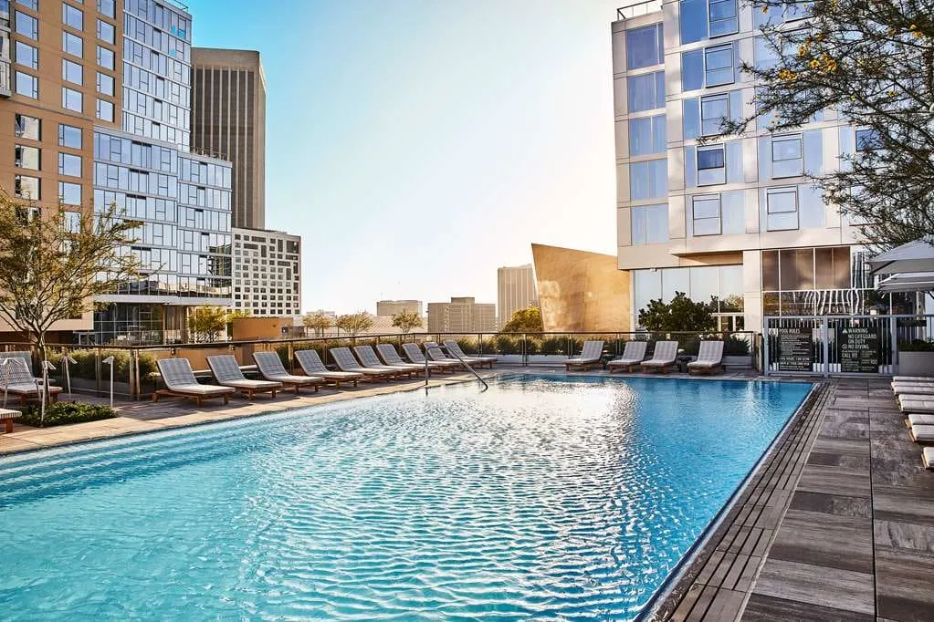 Conrad Los Angeles's rooftop infinity pool atop the Grand LA, over downtown.
