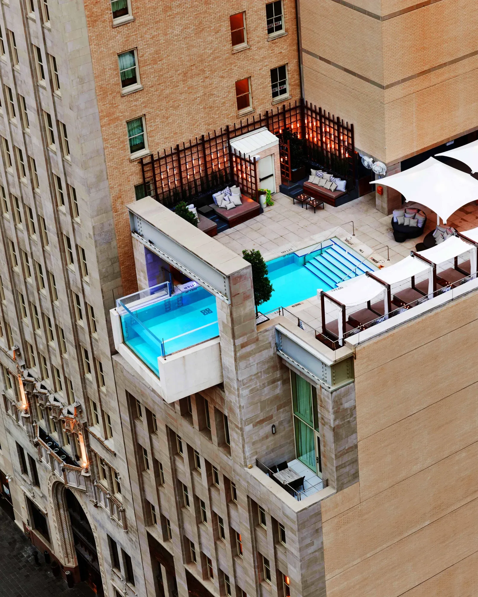 The Joule's glass pool cantilevered over Main Street in downtown Dallas.